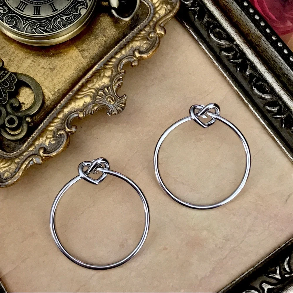 KATE SPADE • Silver Loves Me Knot Hoop Earrings - Picture 4 of 4